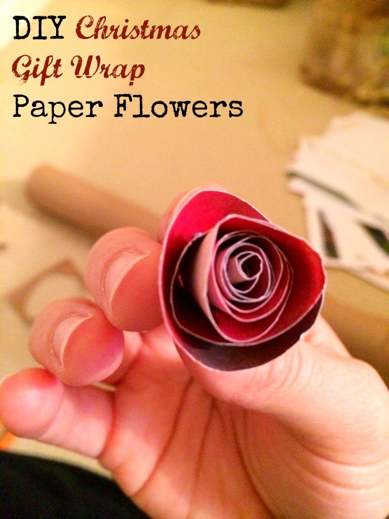 These DIY paper flowers are made out of wrapping paper and are so cute and easy! It's a great way to spruce up your wrapping without spending more!