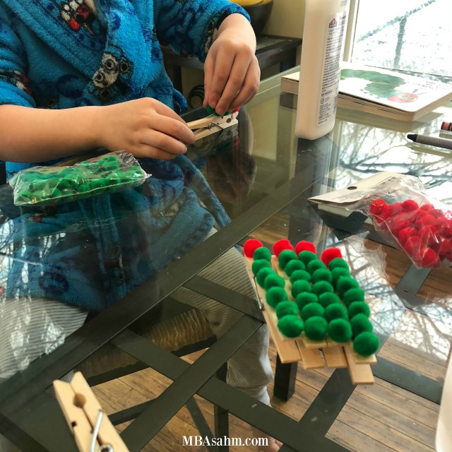 This easy craft idea was so fun to do with my preschooler! The hungry caterpillar is something all kids know and this craft made a perfect gift idea for grandparents, aunts, and uncles.